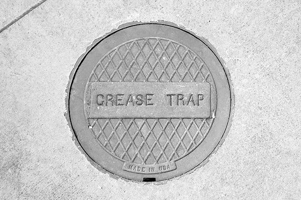 regular grease trap pumping helps prevent clogs and foul odors